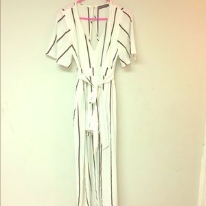 Black and white high low  romper never worn